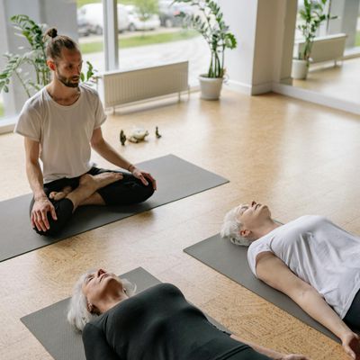 Empty, serene yoga studio with mats ready.